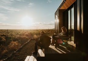 Couple enjoying the views at a desert retreat in Taos New Mexico
