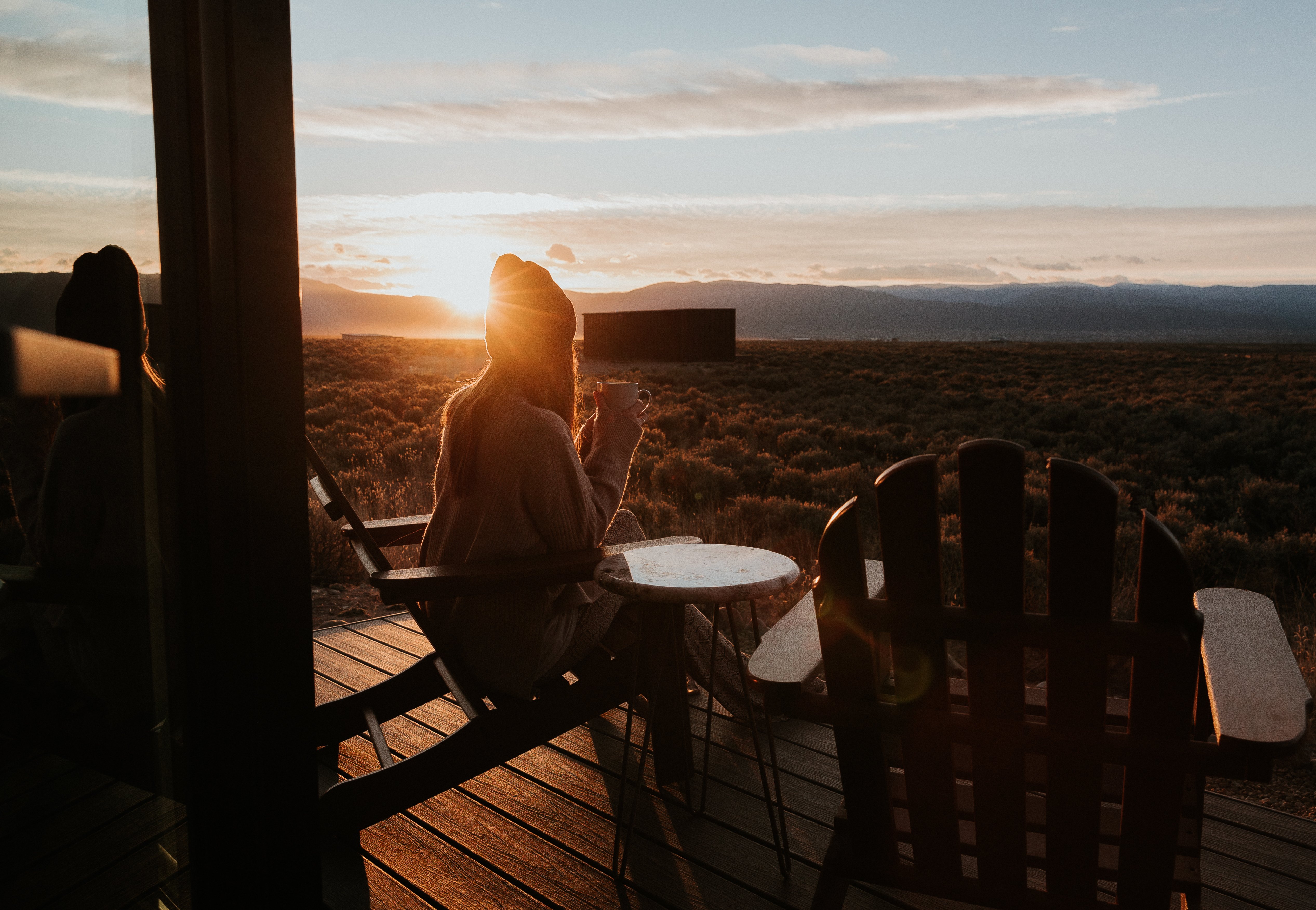 Women enjoying coffee at her desert retreat